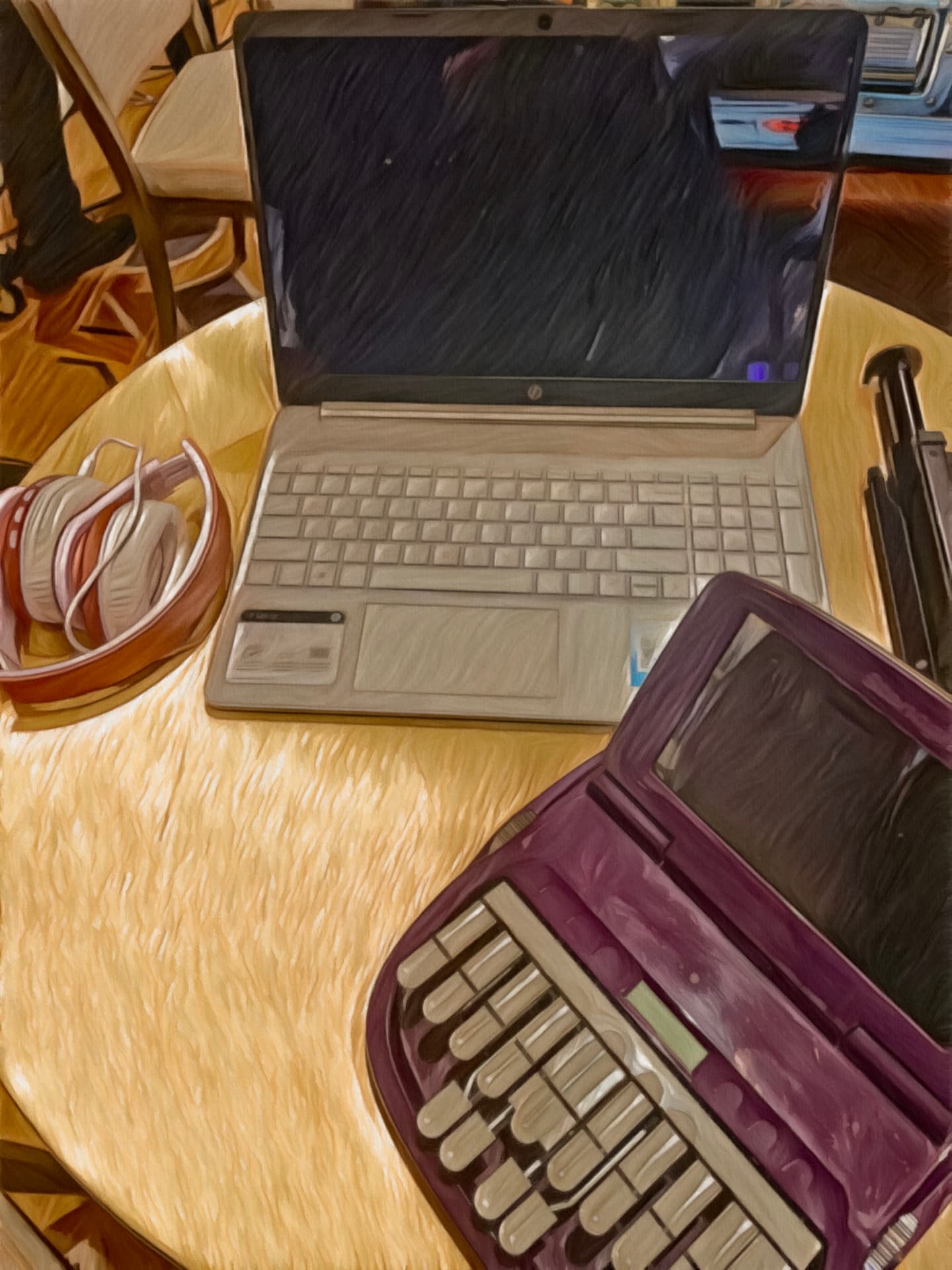 Steno machine, laptop and headphones — the working kit
